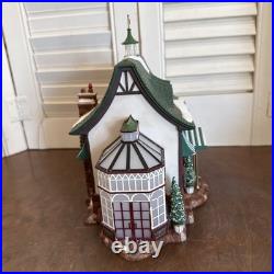 Department 56 Christmas In The City Tavern in the Park light included