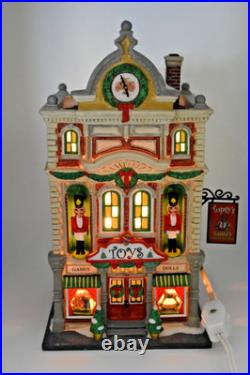 Department 56 Christmas in the City Topsy's Toys Lighted Building #799995 with Box Department 56 Christmas in the City Topsy's Toys Lighted Building #799995 with Box